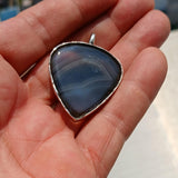 Pear shaped Sterling Silver Heart Artwork Pendant with black and white Agate cabochon