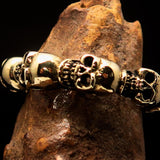 Excellent Mens Brass Biker Band Costume Ring 6 Skulls around the Finger - BikeRing4u