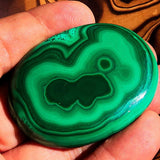 Collectors oval shaped Green Malachite Cabochon 309 CT - 56 mm x 42 mm