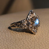 Sterling Silver Solitaire Flower Ring with an oval shaped Moonstone and 8 CZ - BikeRing4u